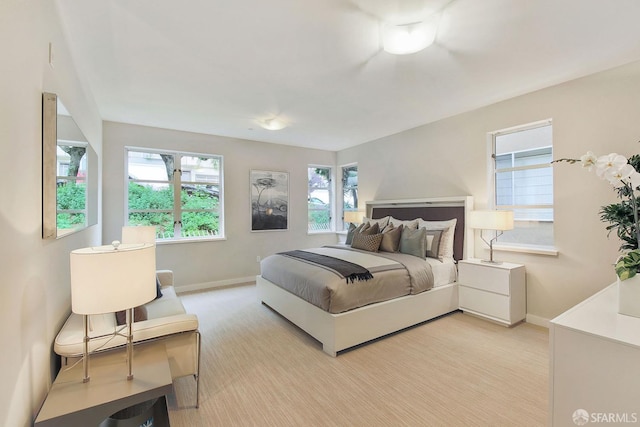 bedroom featuring baseboards