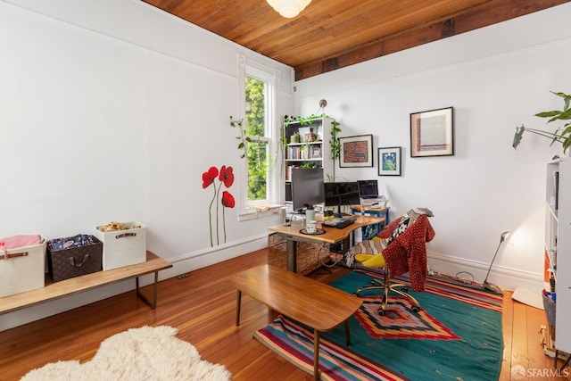 office featuring hardwood / wood-style floors and wooden ceiling