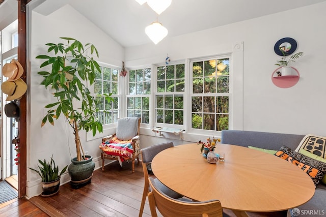 sunroom / solarium with vaulted ceiling