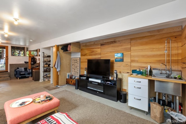 living room featuring wooden walls