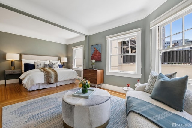 1123 Greenwich St, San Francisco, CA 94109 - bedroom featuring wood finished floors and baseboards