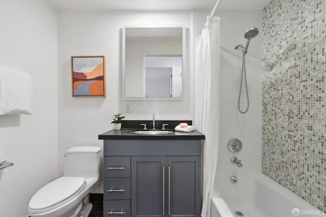 full bathroom featuring shower / bath combination with curtain, vanity, and toilet