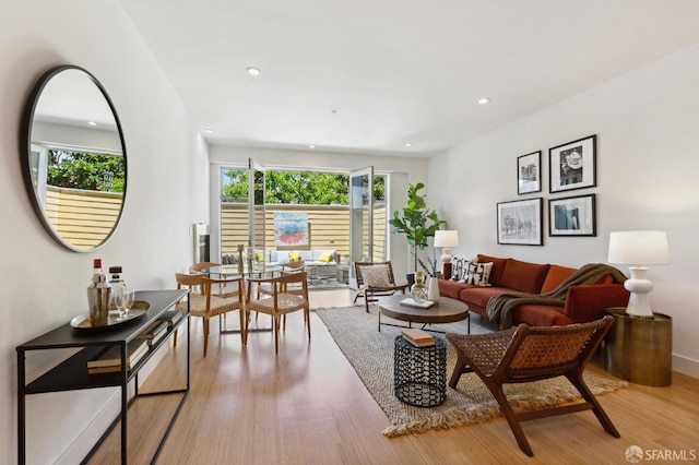 living room with light hardwood / wood-style floors