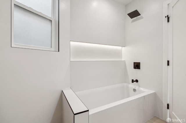 bathroom with washtub / shower combination