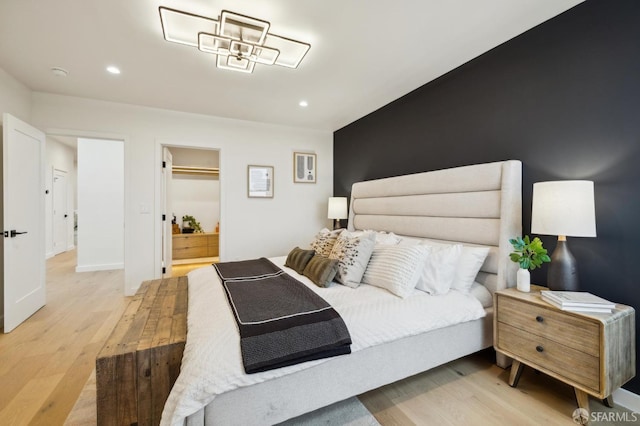 bedroom featuring light wood-type flooring