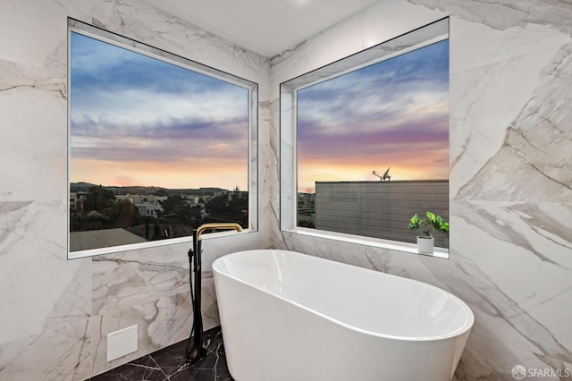 bathroom with a tub