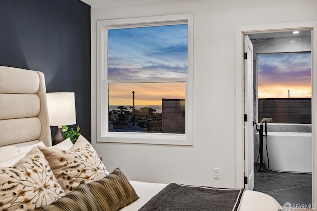 bedroom with multiple windows