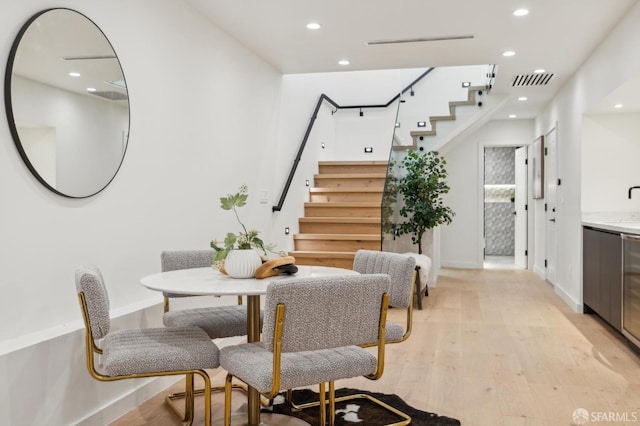 dining room with light hardwood / wood-style floors