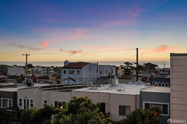 property's view of city featuring a water view