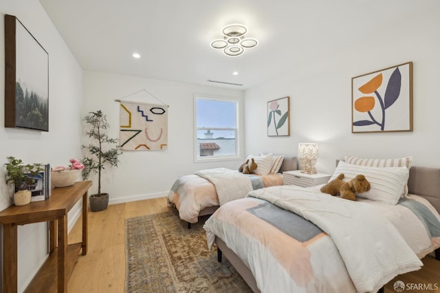 bedroom featuring hardwood / wood-style floors