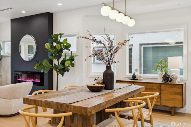 dining space featuring light hardwood / wood-style floors