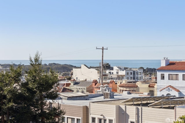 property's view of city featuring a water view