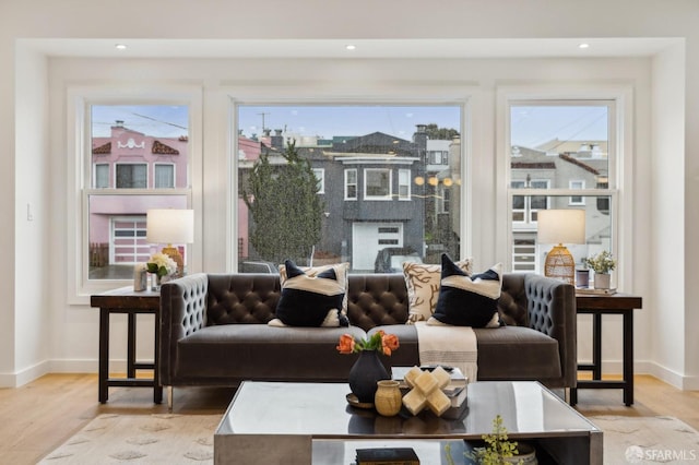 living room with light hardwood / wood-style flooring