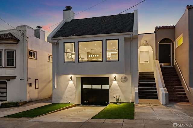 view of front of home with a garage