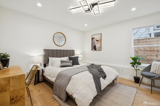 bedroom featuring light hardwood / wood-style flooring