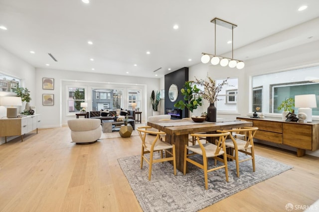 dining room with light wood-type flooring