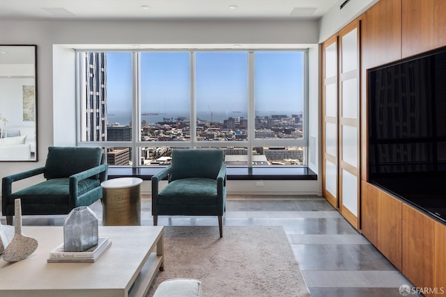 living room featuring a wealth of natural light