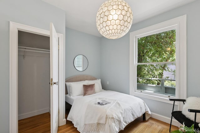 1250 Vallejo St Unit 7, San Francisco, CA 94109 - bedroom featuring wood finished floors and a closet