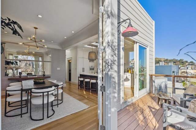 interior space with a wooden deck and an outdoor bar