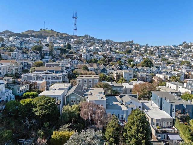 birds eye view of property featuring a mountain view