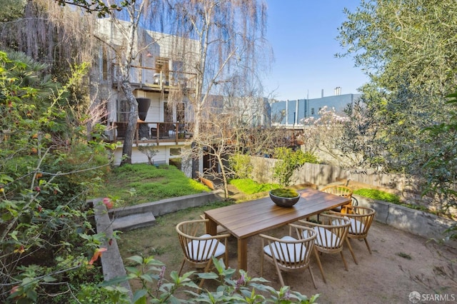 view of patio featuring a balcony