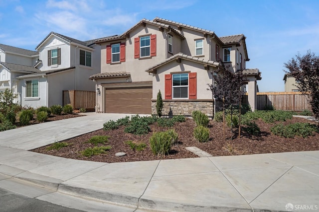 view of front of property with a garage