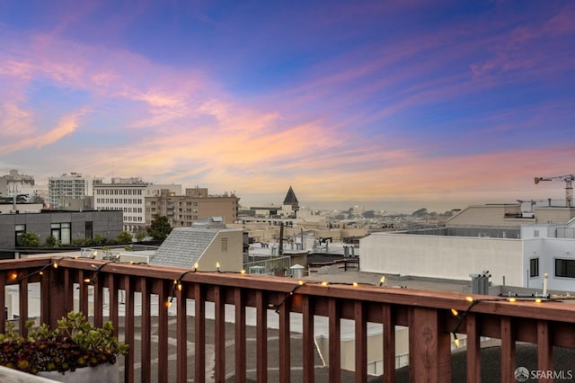 wooden terrace with a city view