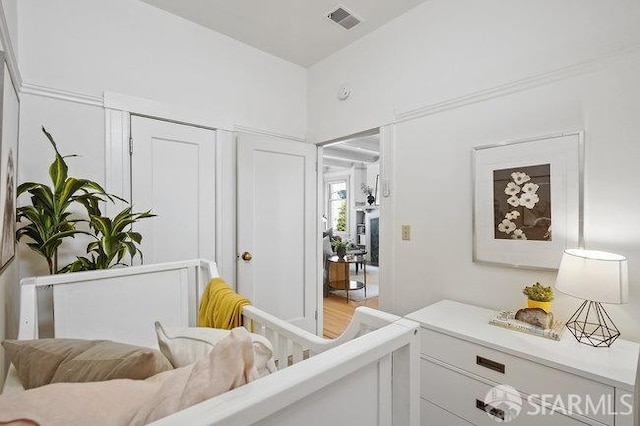 bedroom with visible vents