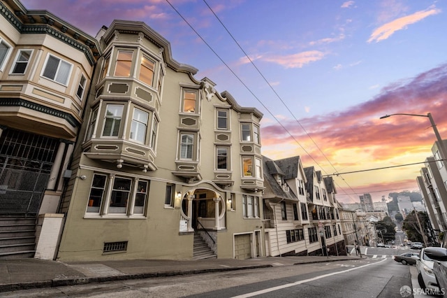 view of property at dusk
