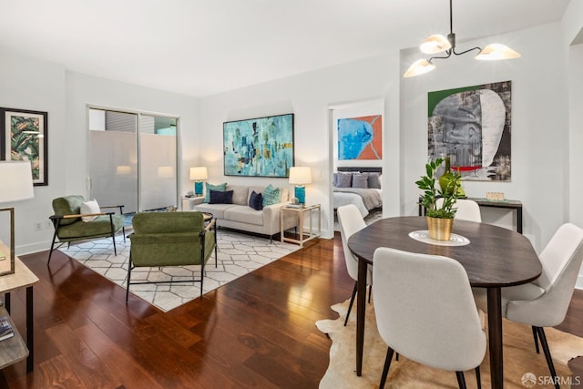 50 Lansing St Unit 106, San Francisco, CA 94105 - dining room featuring wood finished floors, a chandelier, and baseboards