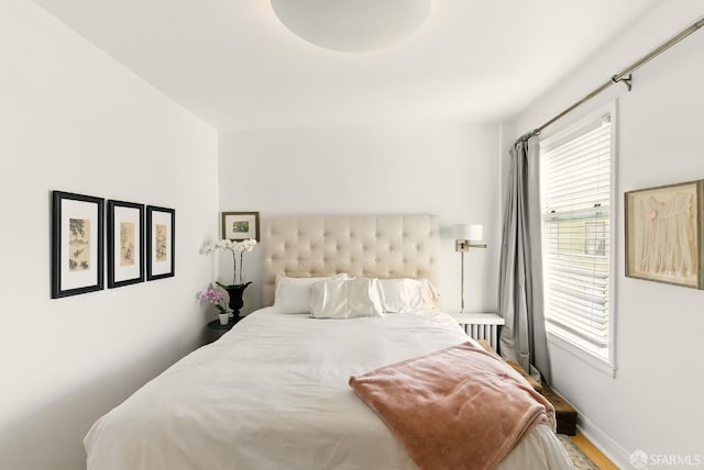 631 Ofarrell St Unit 702, San Francisco, CA 94109 - bedroom featuring wood finished floors and baseboards
