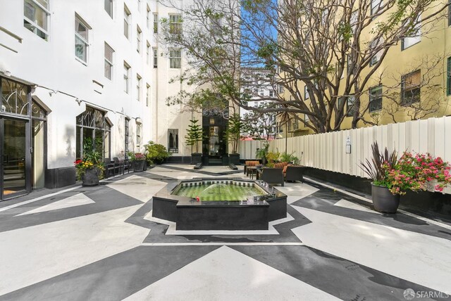 631 Ofarrell St Unit 702, San Francisco, CA 94109 - view of home's community with a jacuzzi and a patio area