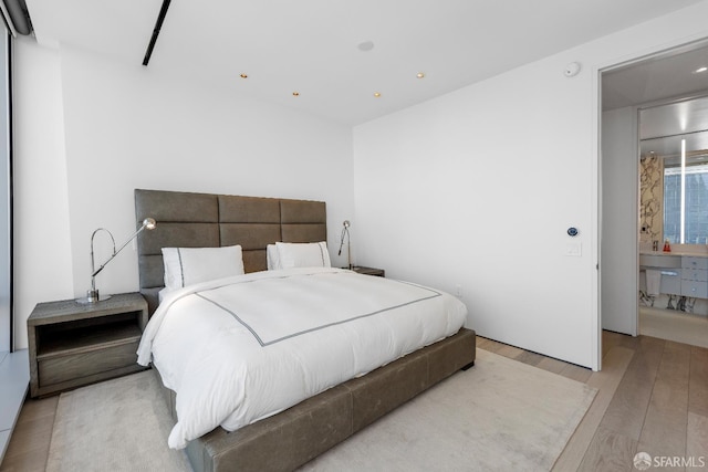 181 Fremont St Unit 58A, San Francisco, CA 94105 - bedroom featuring light wood-type flooring