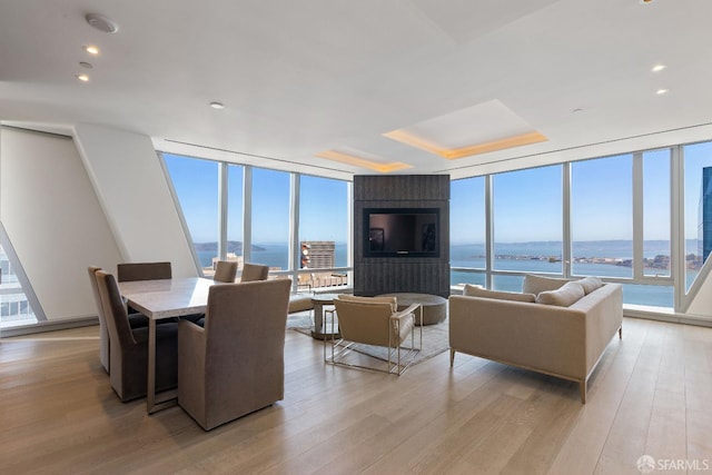 181 Fremont St Unit 58A, San Francisco, CA 94105 - living area with floor to ceiling windows and light wood finished floors