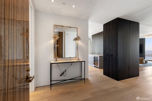 181 Fremont St Unit 58A, San Francisco, CA 94105 - corridor with light wood-style flooring, beverage cooler, and recessed lighting
