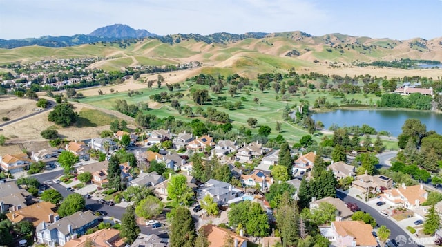 4737 Crestone Peak Dr, Antioch, CA 94531 - drone / aerial view featuring a residential view, a water and mountain view, and golf course view