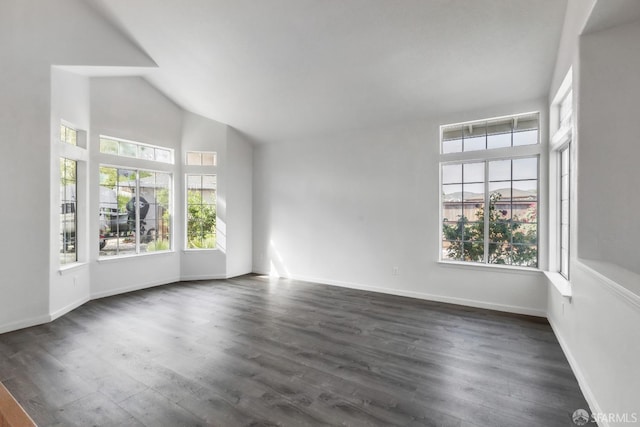4737 Crestone Peak Dr, Antioch, CA 94531 - spare room with baseboards, dark wood-style floors, and high vaulted ceiling