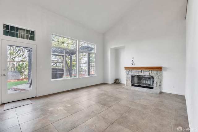 4737 Crestone Peak Dr, Antioch, CA 94531 - unfurnished living room featuring baseboards, high vaulted ceiling, a wealth of natural light, and a fireplace