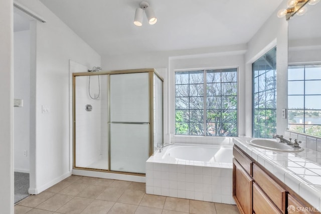 4737 Crestone Peak Dr, Antioch, CA 94531 - bathroom featuring tile patterned flooring, a bath, and a stall shower