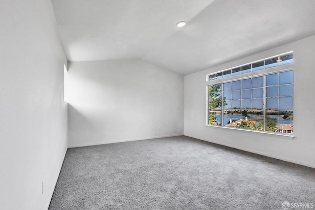 4737 Crestone Peak Dr, Antioch, CA 94531 - spare room featuring carpet floors, baseboards, and lofted ceiling
