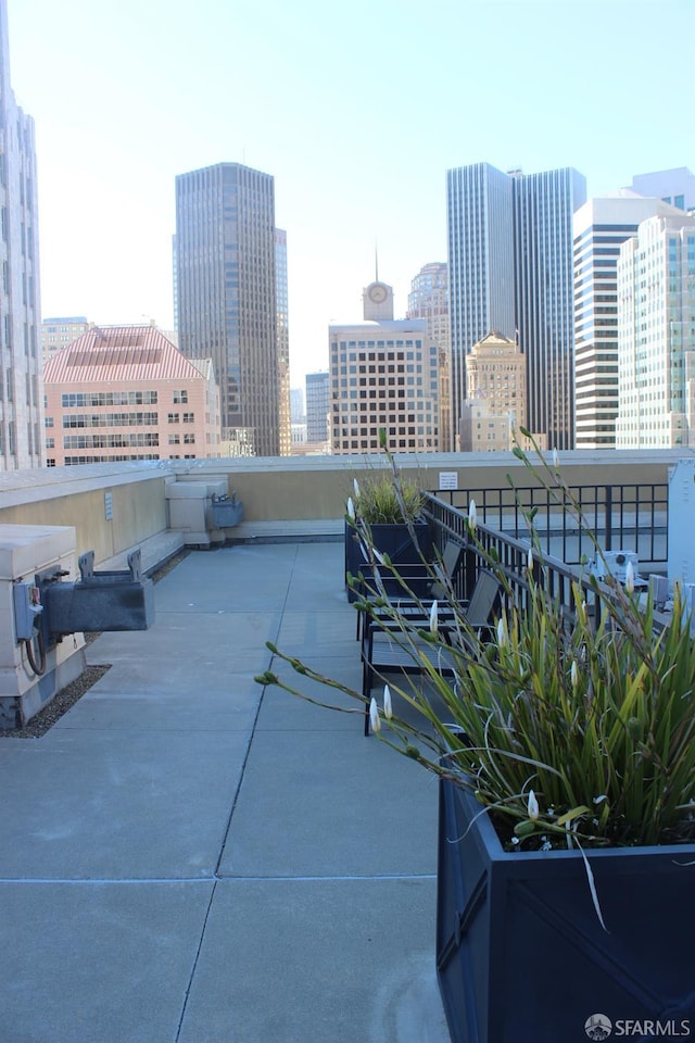 view of patio / terrace with a balcony