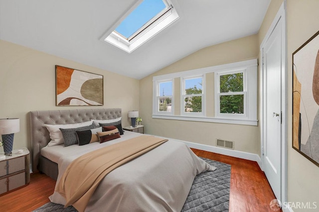3779 Park Boulevard Way, Oakland, CA 94610 - bedroom featuring vaulted ceiling, a skylight, and wood finished floors