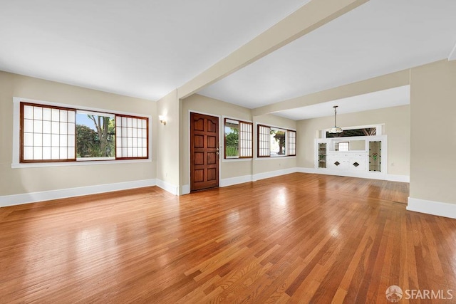 3779 Park Boulevard Way, Oakland, CA 94610 - unfurnished living room with light wood finished floors and baseboards