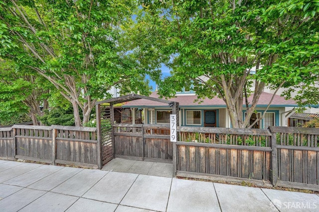 3779 Park Boulevard Way, Oakland, CA 94610 - view of front of home featuring a fenced front yard, covered porch, and a gate