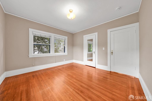 3779 Park Boulevard Way, Oakland, CA 94610 - spare room featuring ornamental molding, light wood-type flooring, and a smoke detector