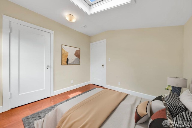 3779 Park Boulevard Way, Oakland, CA 94610 - bedroom with a skylight and wood finished floors