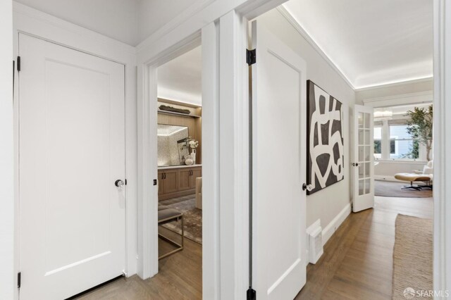 hall featuring wood finished floors