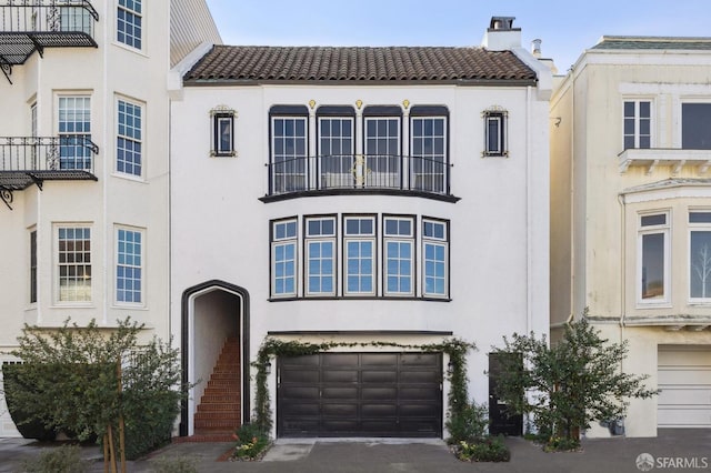 view of front of property with a garage