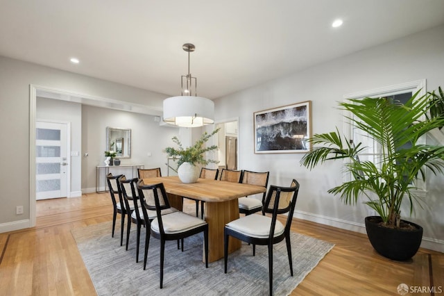 dining space featuring light hardwood / wood-style flooring