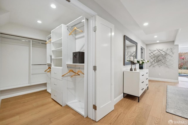 walk in closet featuring light wood-type flooring